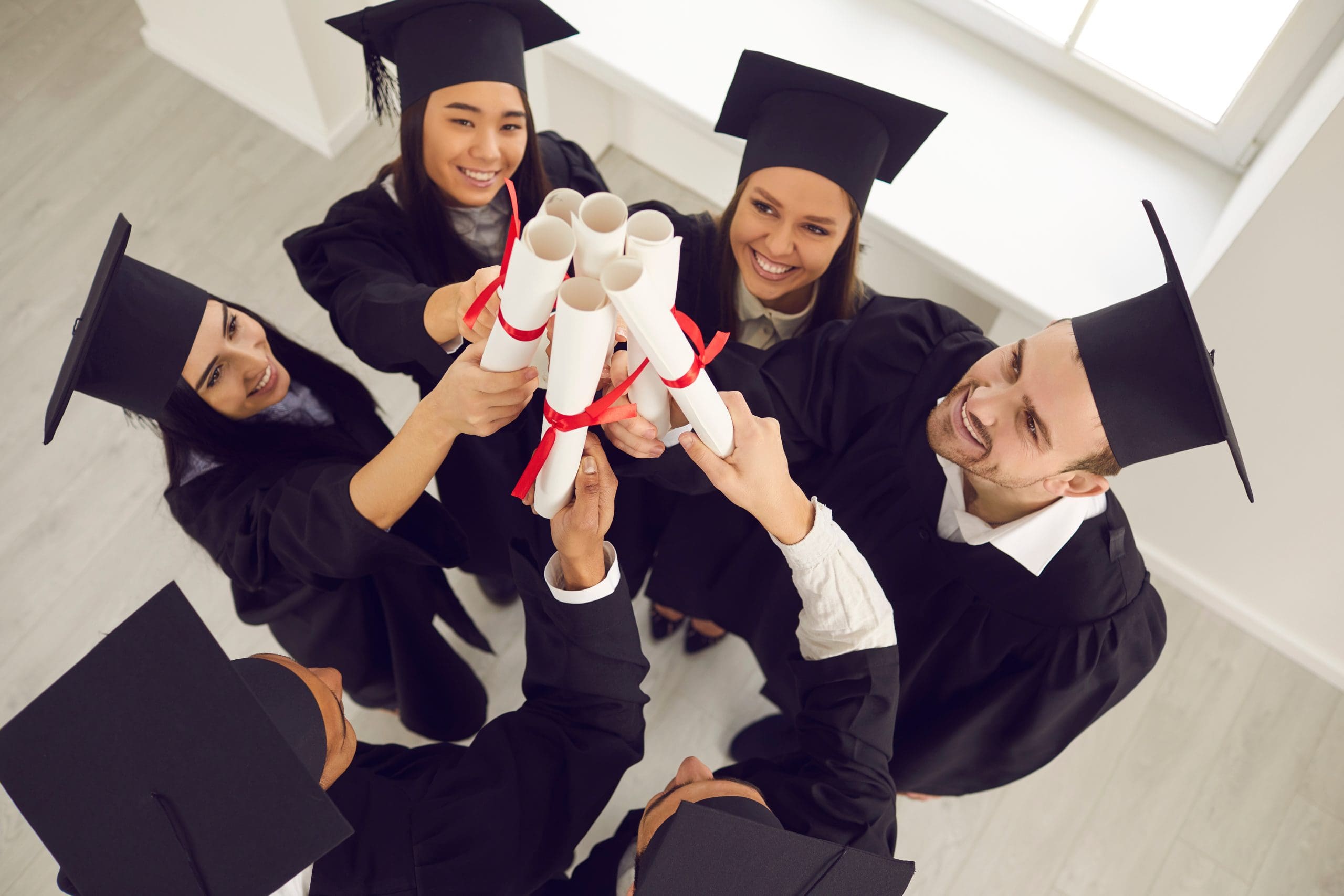 Nurse practitioner students studying together in a bright clinical setting